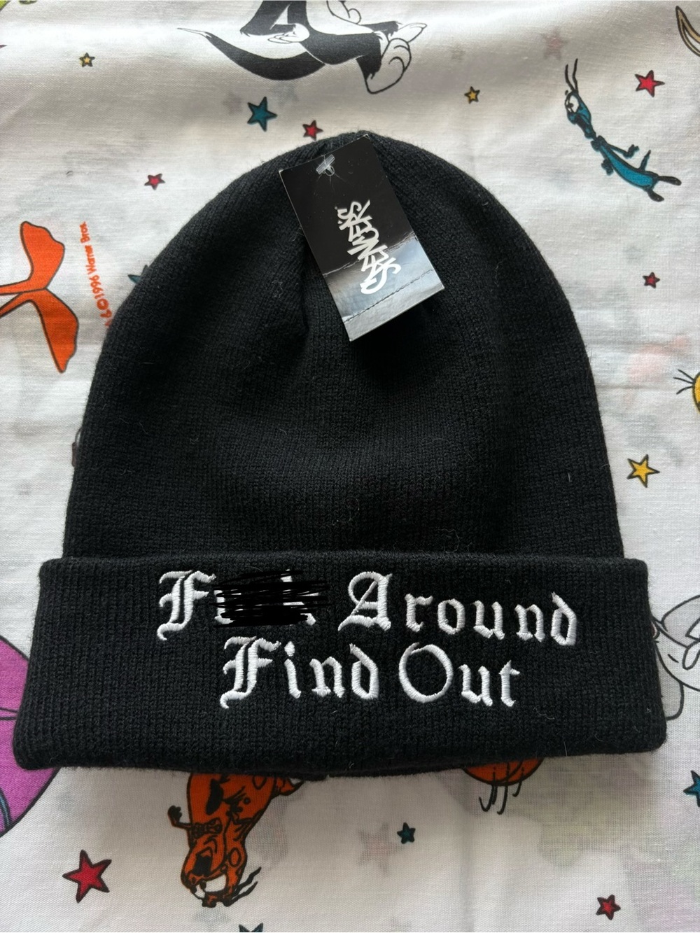 Spencer's Black Knit Beanie with White Embroidered Slogan